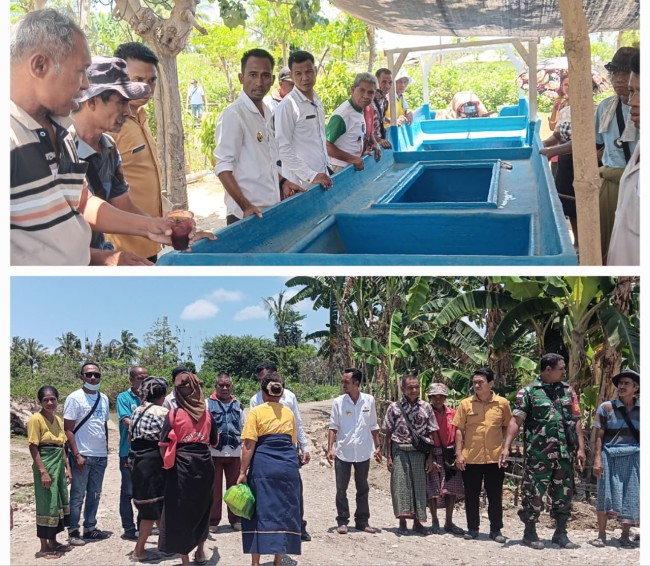 Kepala Desa Mota'ain Ambrosius Klau didampingi, Plt. Kepala Dinas PMD Kabupaten Malaka,  Kladius Kapu meresmikan Jalan Usaha Tani dan Penyerahan Kapal Tangkap Ikan kepala kelompok nelayan Nathedan. (Foto_red)